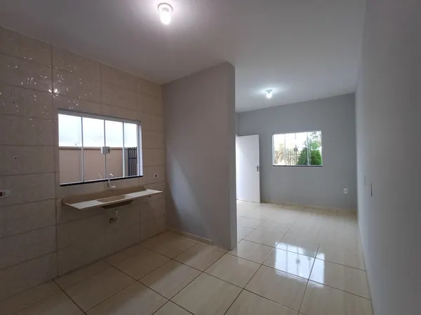 Cozinha aberta para a sala, sem parede entre os dois ambientes